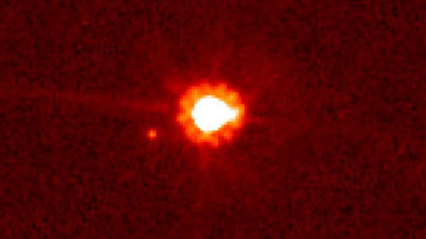 كوكب إيريس و قمره  ديسونوميا من تليسكوب هابل