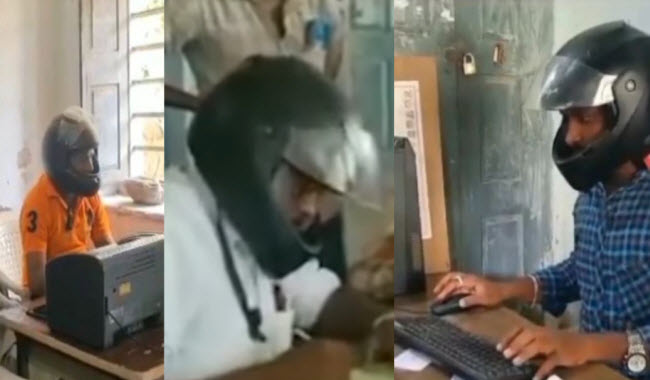 تناقض ساخر .. موظفين مكتب تطوير البنية التحتية في الهند يرتدون خوذات لحماية رؤوسهم من تهالك سقف المبني